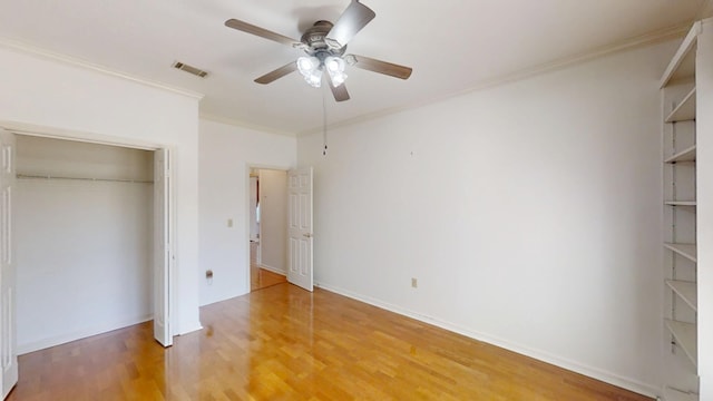 4154 Bent Tree Ln, Martinez, GA 30907 - unfurnished bedroom featuring light wood-style flooring, a closet, ornamental molding, and ceiling fan