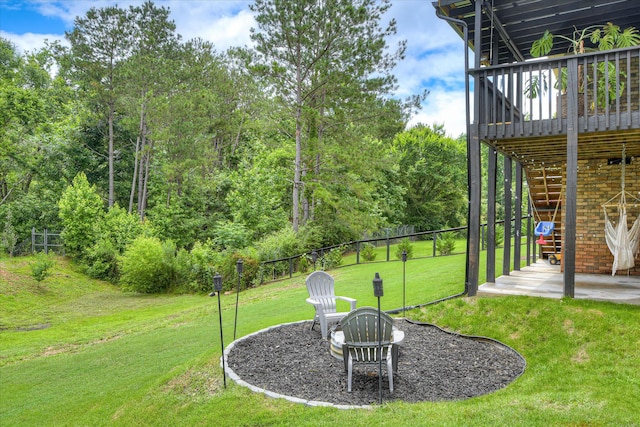 841 High Green Ct, Grovetown, GA 30813 - view of yard featuring stairway, a deck, a patio area, and an outdoor fire pit