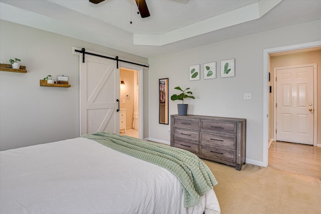 841 High Green Ct, Grovetown, GA 30813 - bedroom with a barn door, light colored carpet, ceiling fan, and ensuite bath
