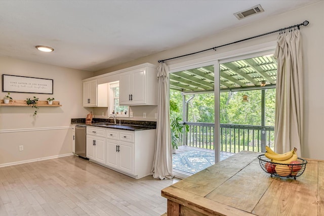 841 High Green Ct, Grovetown, GA 30813 - kitchen featuring stainless steel dishwasher, white cabinets, and light wood finished floors