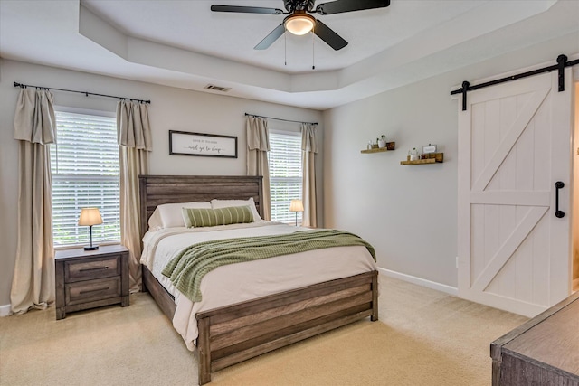 841 High Green Ct, Grovetown, GA 30813 - bedroom featuring light carpet, a barn door, multiple windows, and a ceiling fan