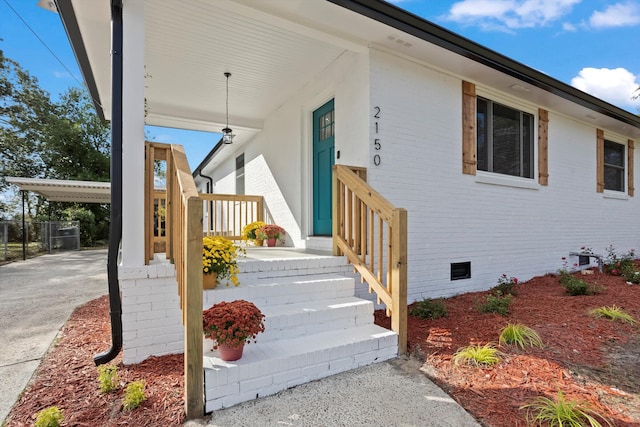 property entrance with a porch