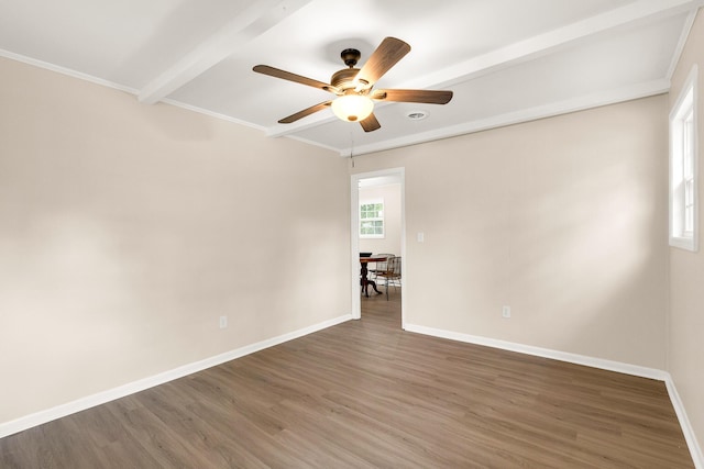 2512 Drayton Dr, Augusta, GA 30906 - spare room with ceiling fan, wood finished floors, baseboards, beamed ceiling, and crown molding