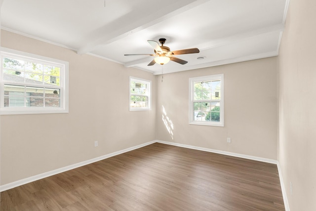 2512 Drayton Dr, Augusta, GA 30906 - empty room with plenty of natural light, wood finished floors, baseboards, ceiling fan, and beam ceiling