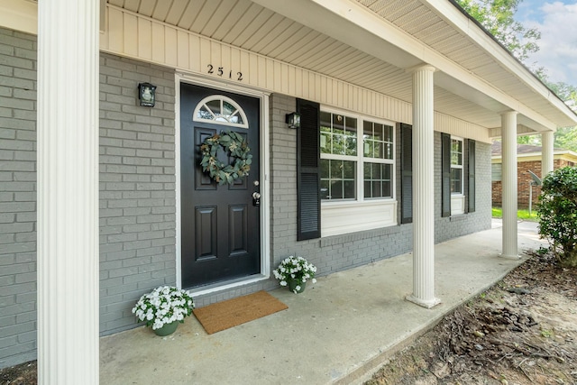 2512 Drayton Dr, Augusta, GA 30906 - property entrance featuring a porch and brick siding
