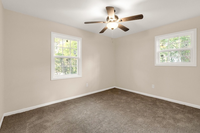 2512 Drayton Dr, Augusta, GA 30906 - spare room featuring healthy amount of natural light, dark colored carpet, and baseboards