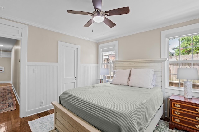 1216 Heard Ave, Augusta, GA 30904 - bedroom featuring wood finished floors, wainscoting, crown molding, and ceiling fan