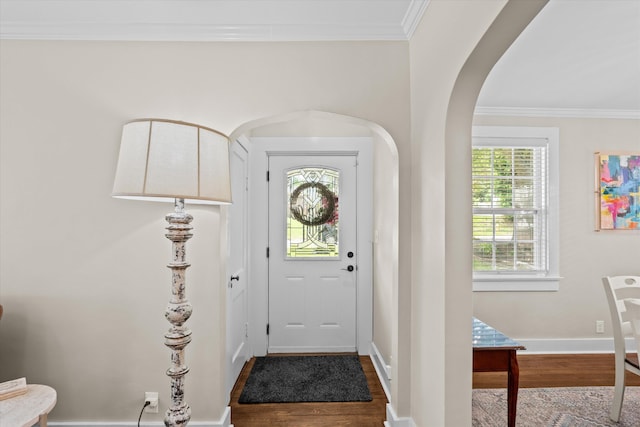 1216 Heard Ave, Augusta, GA 30904 - foyer featuring dark wood-type flooring, arched walkways, and ornamental molding