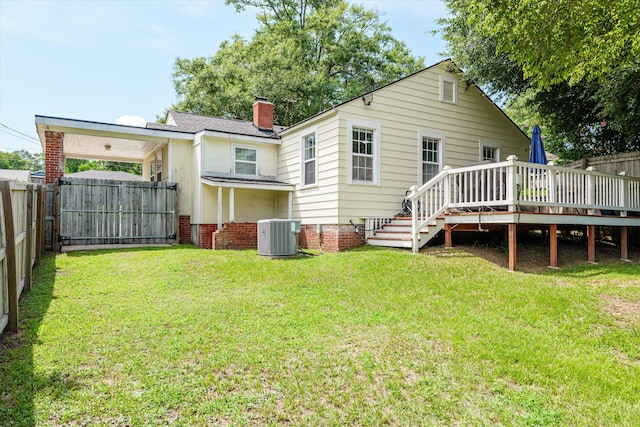 1216 Heard Ave, Augusta, GA 30904 - rear view of house featuring a deck, a fenced backyard, and a chimney