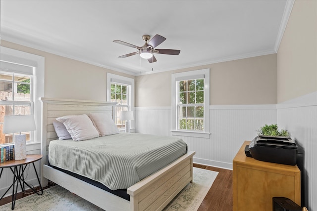 1216 Heard Ave, Augusta, GA 30904 - bedroom with wainscoting, wood finished floors, ornamental molding, and ceiling fan