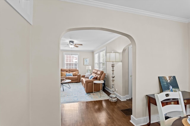 1216 Heard Ave, Augusta, GA 30904 - living room with arched walkways, ceiling fan, crown molding, and wood finished floors