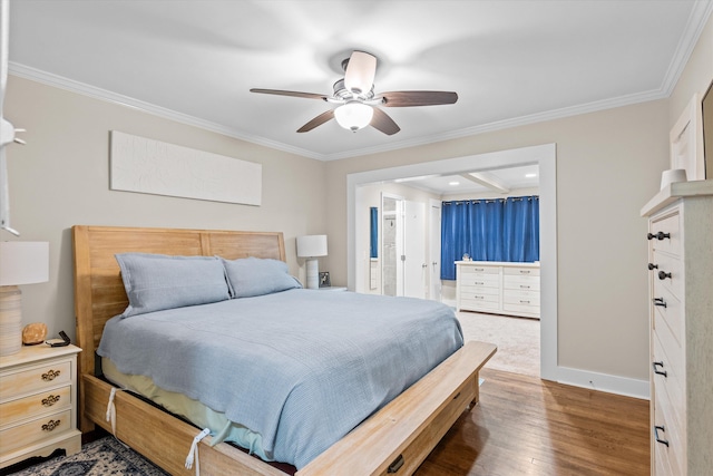 1216 Heard Ave, Augusta, GA 30904 - bedroom featuring ornamental molding, wood finished floors, ceiling fan, and ensuite bathroom