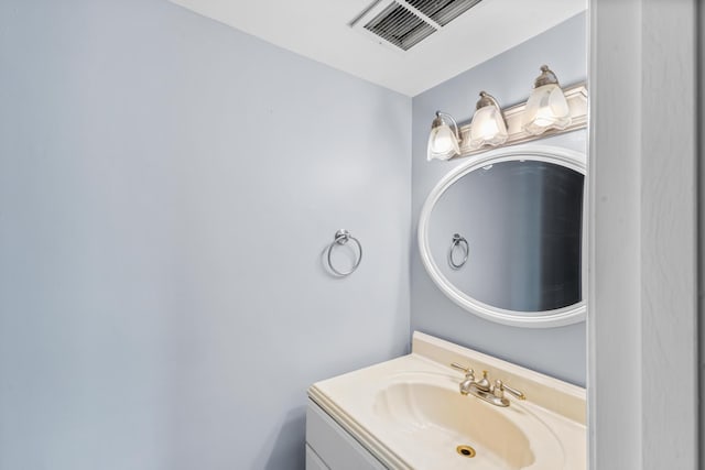 bathroom featuring vanity and visible vents