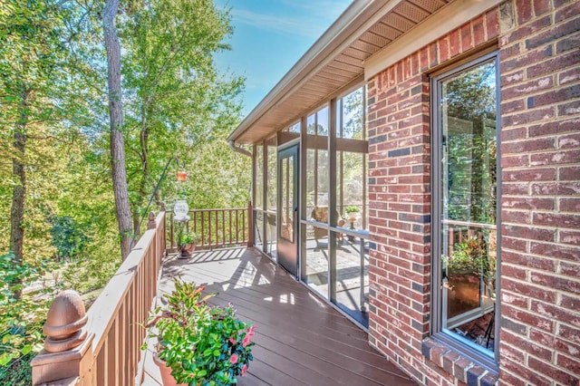 wooden terrace with a sunroom