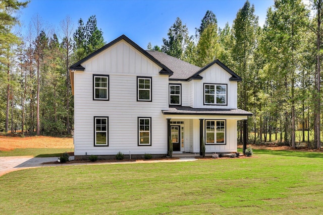 view of front of home featuring a front lawn and a porch