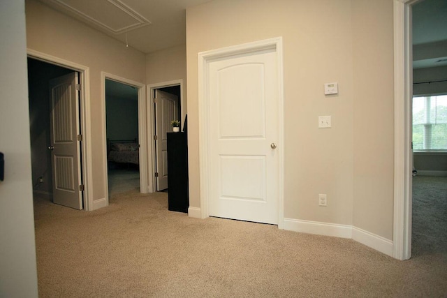 1144 George W Crawford Dr, Augusta, GA 30909 - hallway with carpet, attic access, and baseboards