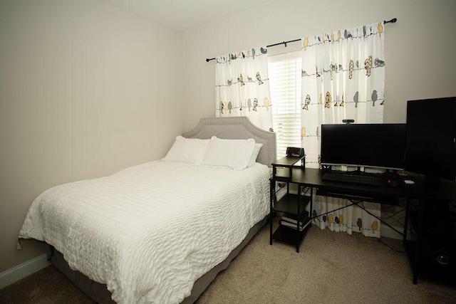 1144 George W Crawford Dr, Augusta, GA 30909 - bedroom with carpet flooring and baseboards