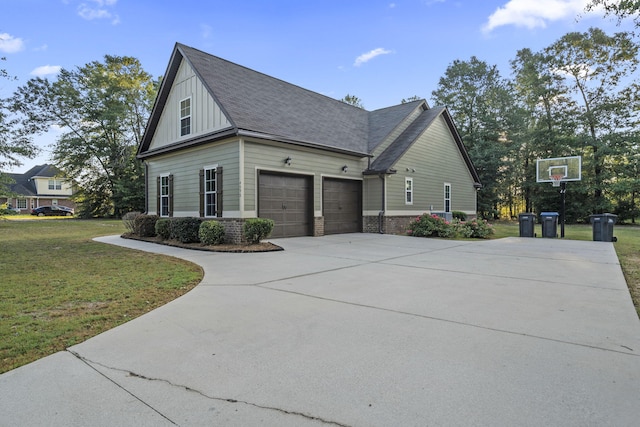 4752 Storey Mill Rd, Hephzibah, GA 30815 - view of side of property featuring driveway, a lawn, a garage, a shingled roof, and board and batten siding