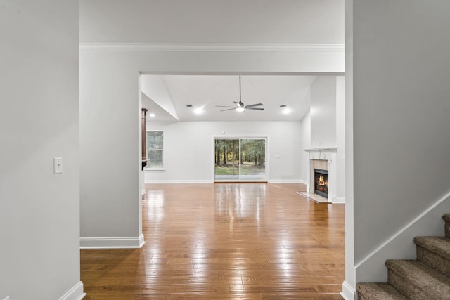 4752 Storey Mill Rd, Hephzibah, GA 30815 - unfurnished living room with a ceiling fan, a premium fireplace, hardwood / wood-style floors, lofted ceiling, and stairway