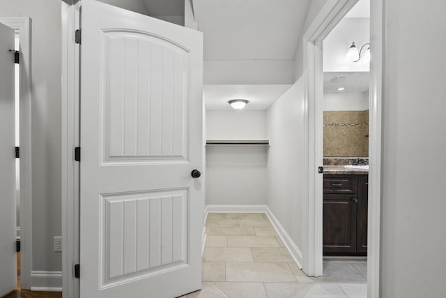 4752 Storey Mill Rd, Hephzibah, GA 30815 - walk in closet with light tile patterned flooring