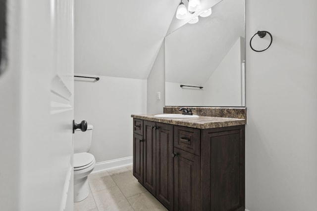 4752 Storey Mill Rd, Hephzibah, GA 30815 - bathroom featuring vanity, lofted ceiling, and tile patterned flooring