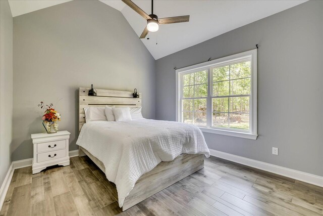 7054 Rance Perry Rd, Appling, GA 30802 - bedroom with wood finished floors, ceiling fan, baseboards, and vaulted ceiling