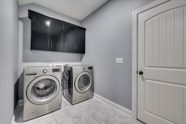 7054 Rance Perry Rd, Appling, GA 30802 - washroom with light tile patterned flooring, baseboards, cabinet space, and washing machine and dryer