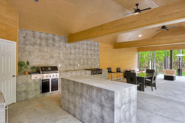 7054 Rance Perry Rd, Appling, GA 30802 - view of patio / terrace featuring a grill, outdoor dining space, exterior kitchen, and a ceiling fan