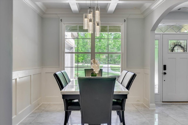 7054 Rance Perry Rd, Appling, GA 30802 - dining space with visible vents, arched walkways, an inviting chandelier, a decorative wall, and beamed ceiling