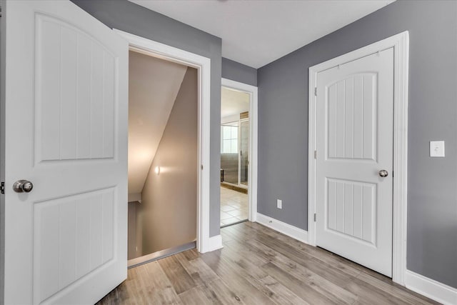 7054 Rance Perry Rd, Appling, GA 30802 - unfurnished bedroom featuring baseboards and wood finished floors