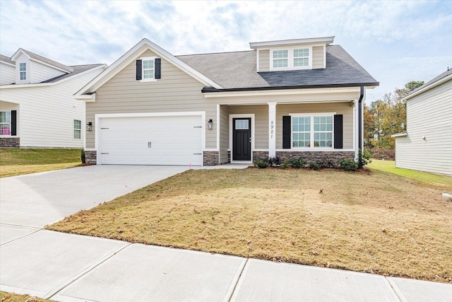 5921 Big Pond Trl, Grovetown, GA 30813 - craftsman-style house featuring driveway, a front lawn, stone siding, and a porch