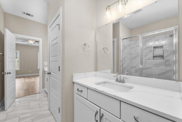 5921 Big Pond Trl, Grovetown, GA 30813 - full bath featuring vanity, a stall shower, marble finish floors, and ceiling fan