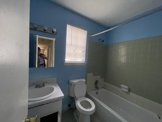 full bathroom with vanity, toilet, and shower / bathtub combination