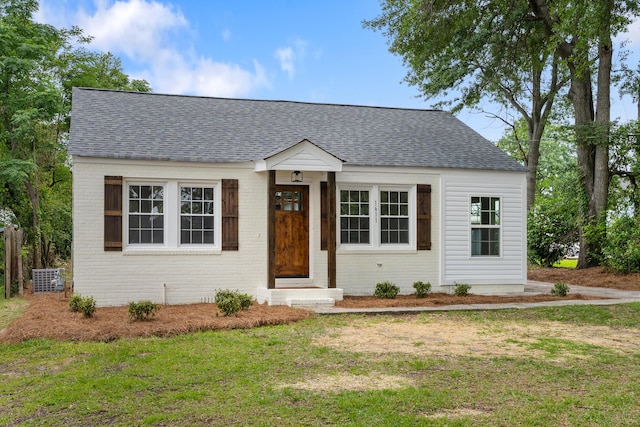 1611 Monte Sano Ave, Augusta, GA 30904 - view of front of house with brick siding, roof with shingles, and a front yard