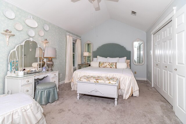 1300 Concord Ave, North Augusta, SC 29841 - bedroom featuring light carpet, vaulted ceiling, a closet, a ceiling fan, and baseboards