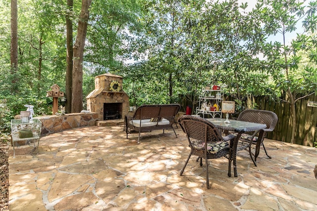 1300 Concord Ave, North Augusta, SC 29841 - view of patio / terrace featuring an outdoor stone fireplace and outdoor dining area