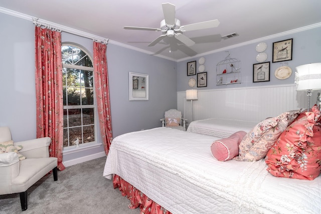 1300 Concord Ave, North Augusta, SC 29841 - carpeted bedroom featuring crown molding, wainscoting, and a ceiling fan