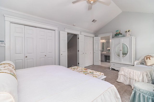 1300 Concord Ave, North Augusta, SC 29841 - carpeted bedroom with multiple closets, lofted ceiling, ensuite bath, and a ceiling fan