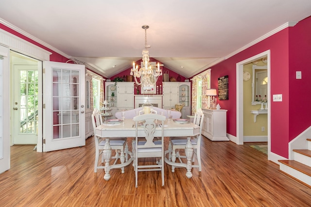 1300 Concord Ave, North Augusta, SC 29841 - dining area featuring light wood-style flooring, ornamental molding, plenty of natural light, baseboards, and lofted ceiling
