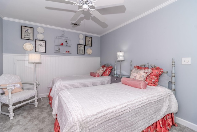 1300 Concord Ave, North Augusta, SC 29841 - carpeted bedroom with wainscoting, ornamental molding, and a ceiling fan