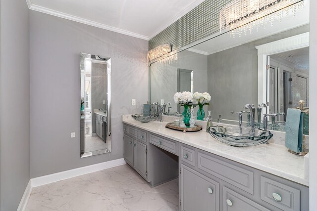 1300 Concord Ave, North Augusta, SC 29841 - bathroom featuring ornamental molding, baseboards, marble look tiles, and double vanity