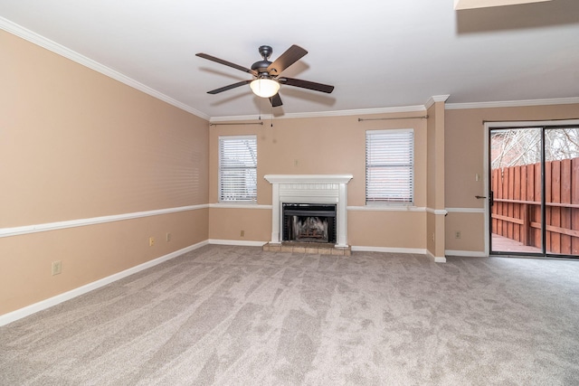 unfurnished living room featuring light carpet, ceiling fan, and ornamental molding