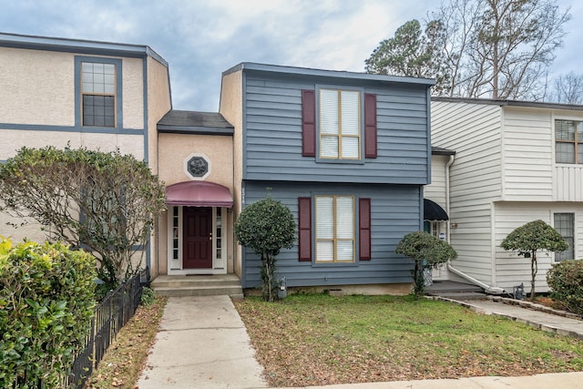 view of front of house with a front yard