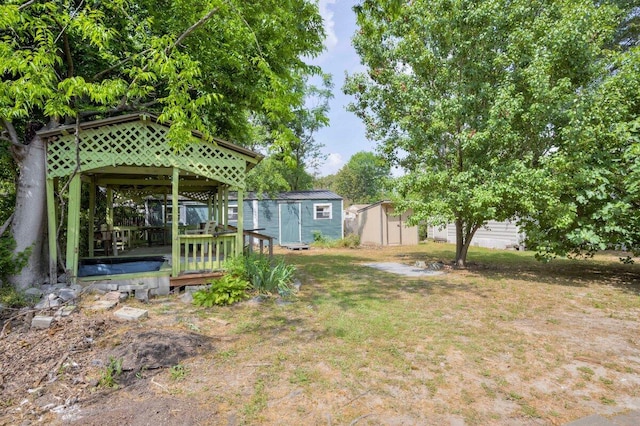 2011 Denmark Dr, Augusta, GA 30906 - view of yard with a storage shed, an outdoor structure, a gazebo, and a deck