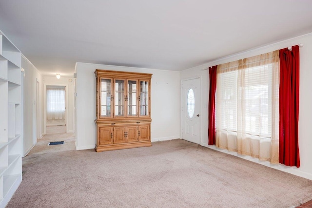 2011 Denmark Dr, Augusta, GA 30906 - foyer entrance with plenty of natural light, baseboards, visible vents, and light carpet