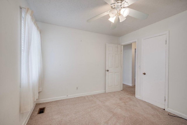 2011 Denmark Dr, Augusta, GA 30906 - unfurnished bedroom with carpet floors, baseboards, a textured ceiling, and visible vents