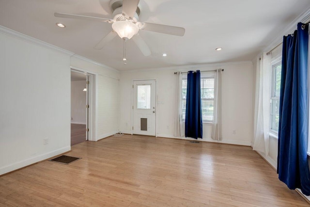 2011 Denmark Dr, Augusta, GA 30906 - unfurnished room featuring crown molding, baseboards, ceiling fan, and visible vents