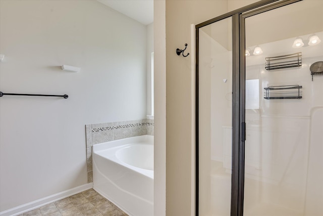 863 Westlawn Dr, Grovetown, GA 30813 - full bath with a shower stall, a bath, and baseboards