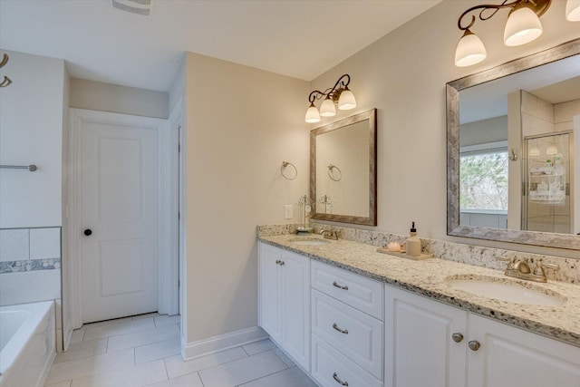 bathroom with vanity, tile patterned floors, and plus walk in shower