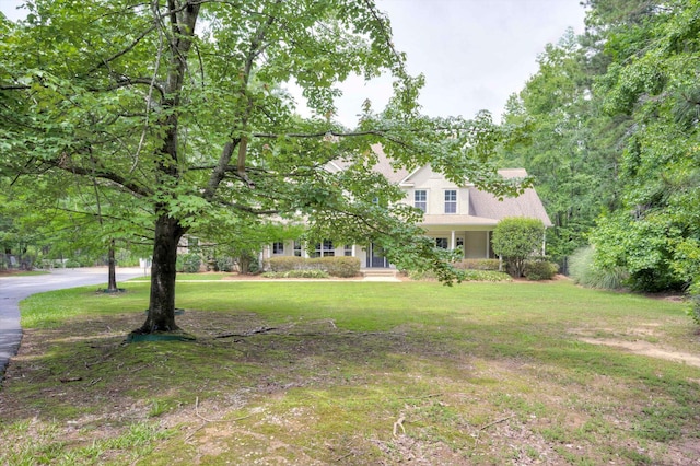 2288 William Few Pkwy, Evans, GA 30809 - view of property hidden behind natural elements featuring a front lawn